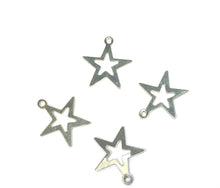 Stunning silver cut out star charm , Sku #500C23